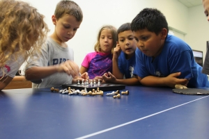 Our After School Program encourages children to improve their focus with chess.