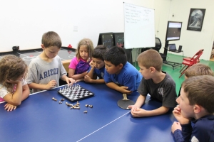 All our kids love learning and playing chess together!