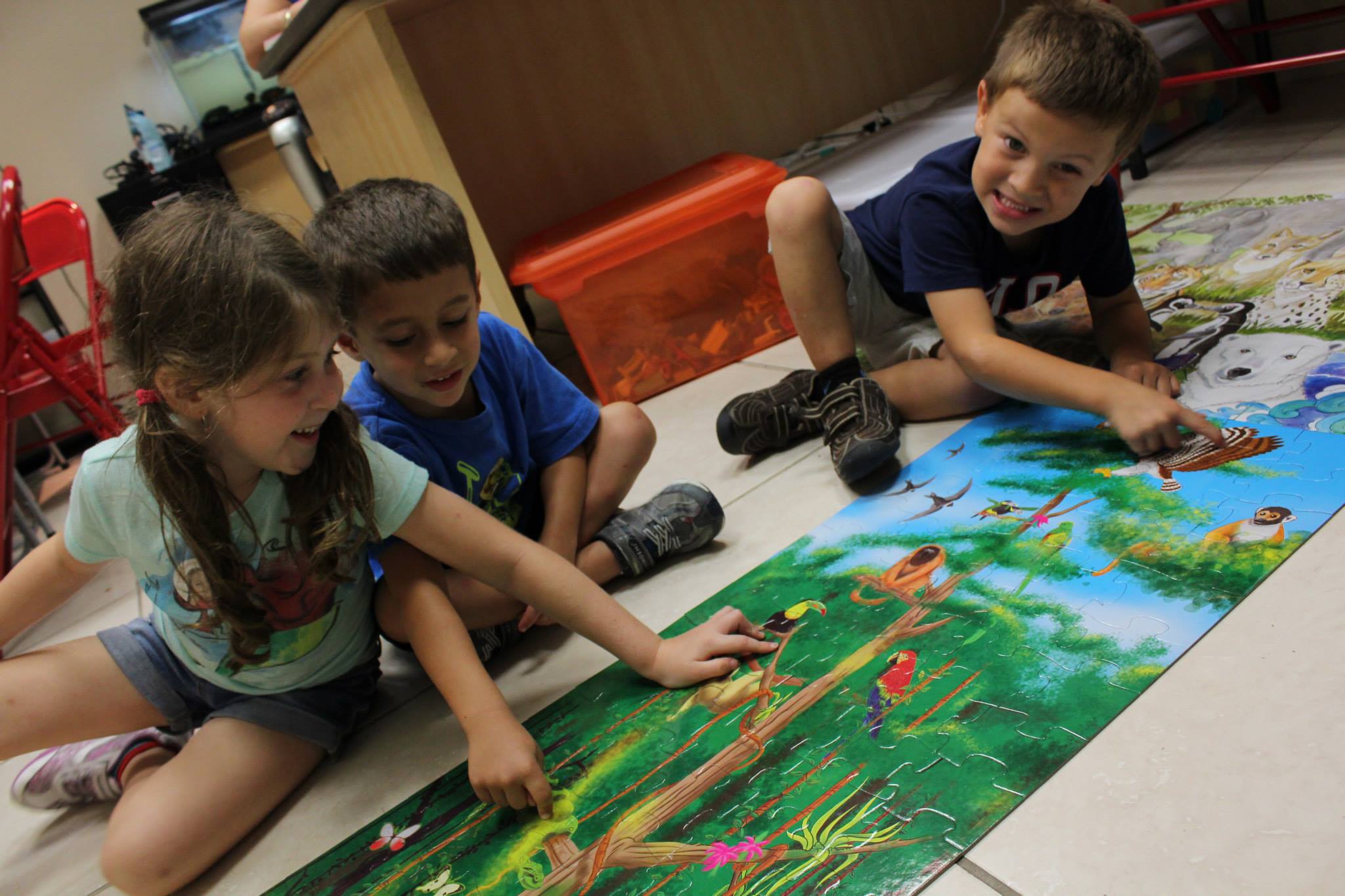 The Little Ones Love Building puzzles In Their Free Play Time